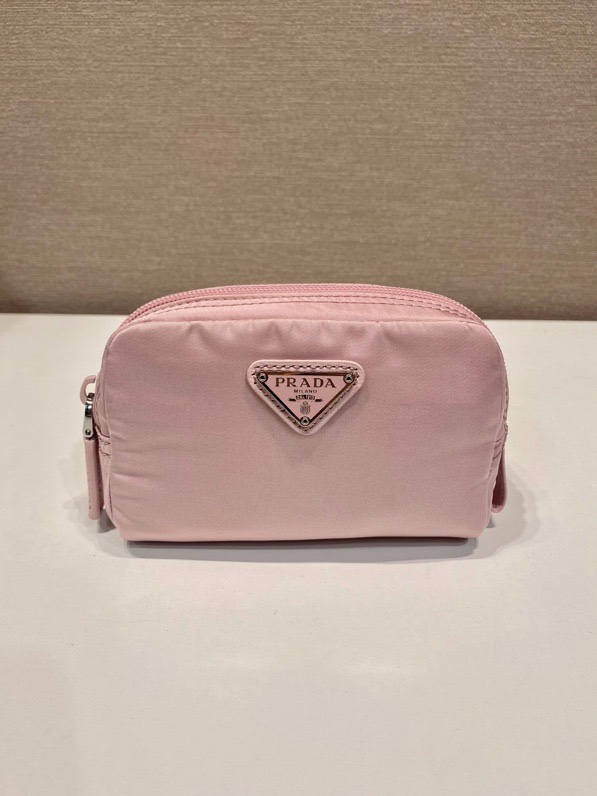 Pra*a clutch bags